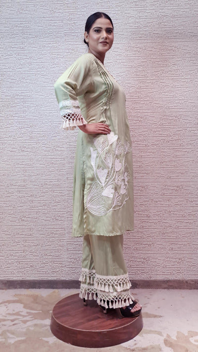 Pastel Green Suit Set In Cotton Linen Fabric Highlighted With Stunning Crochet Work