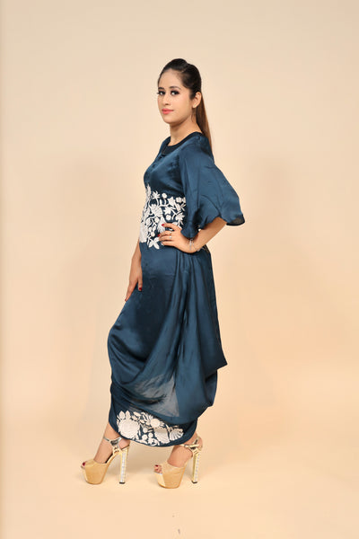 model posing wearing navy blue satin silk dress