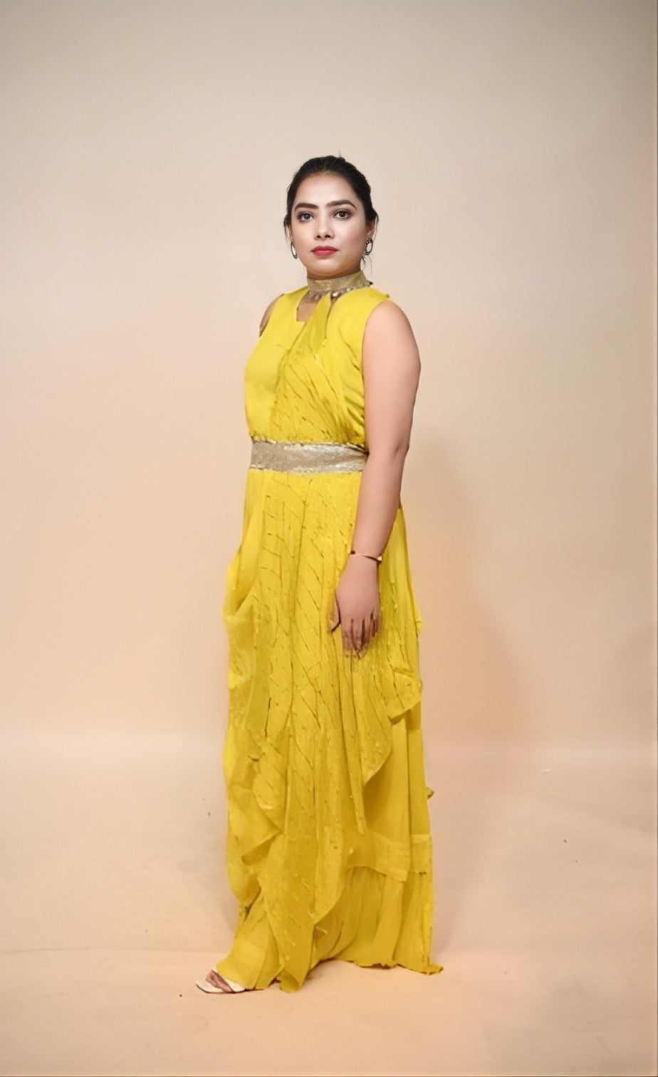 woman standing wearing yellow georgette dress