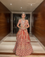 Rust mettalic luxury lehenga