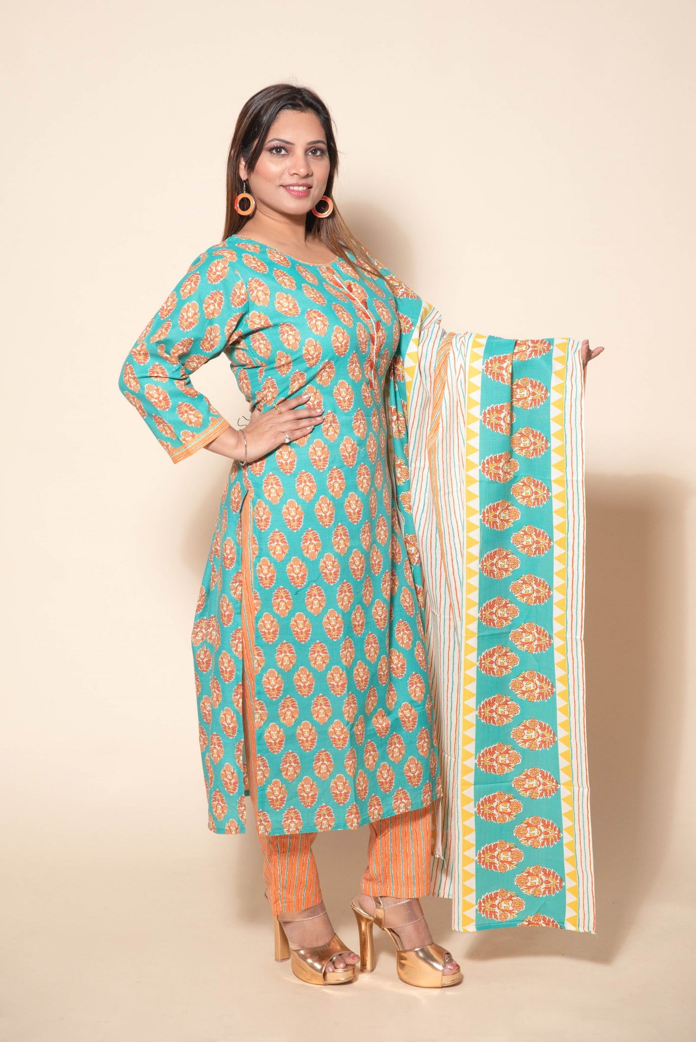 model posing in printed cotton suit