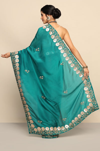 Enchanting Emerald Silk Saree: A Jewel of Elegance