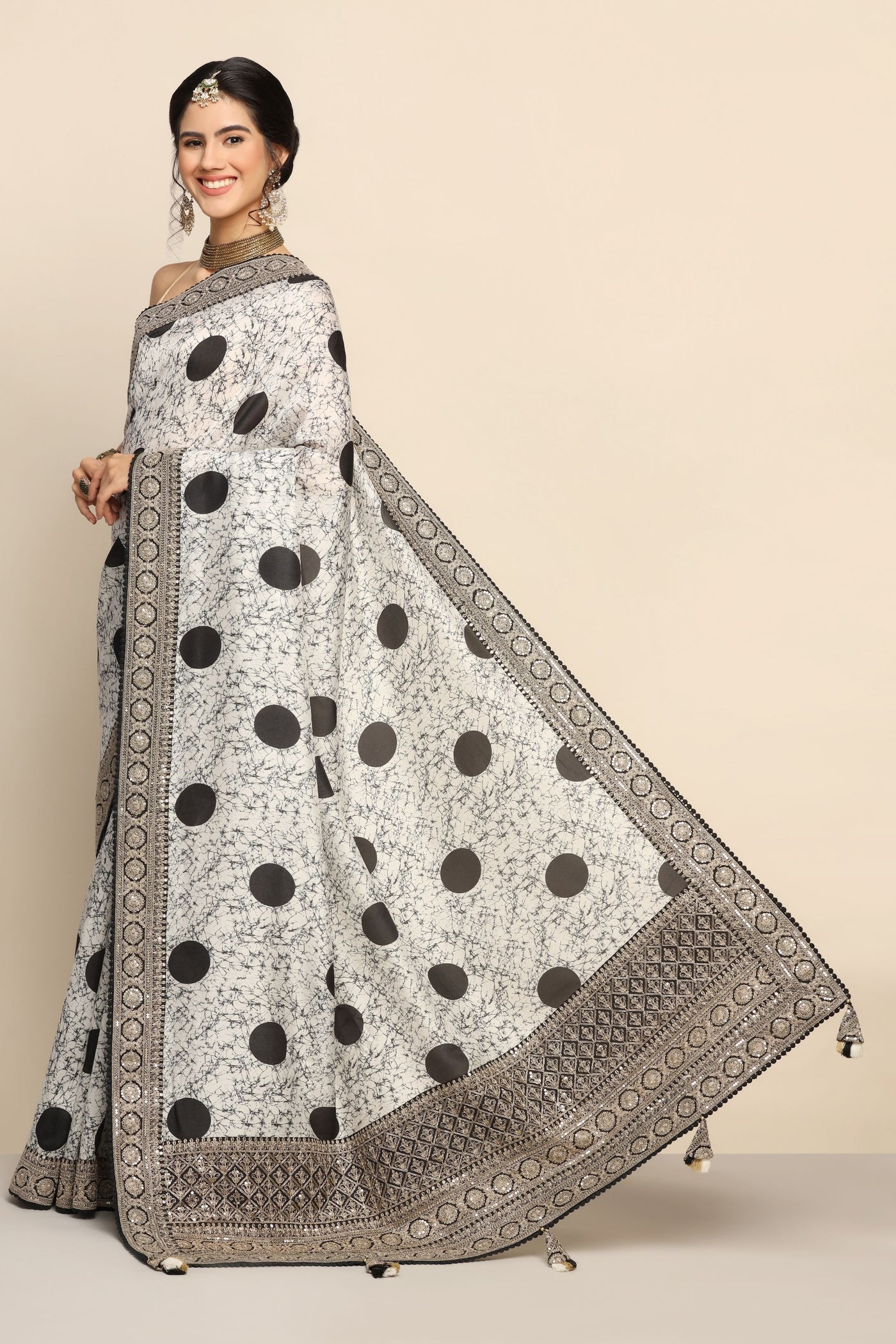 Elegance Redefined: Black and White Saree with Geometrical Print and Sparkling Embellishments