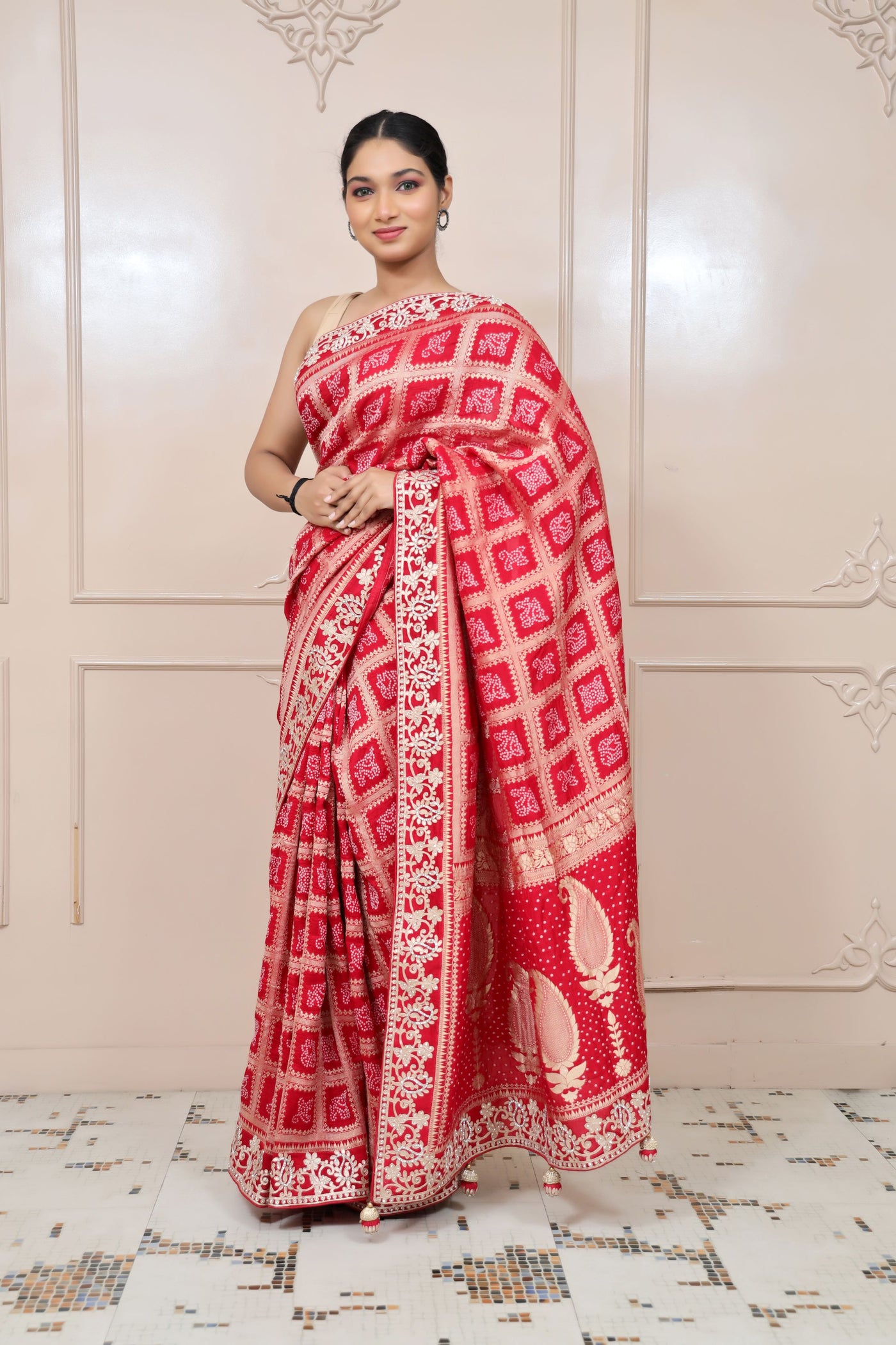 classy red color check with floral motif saree