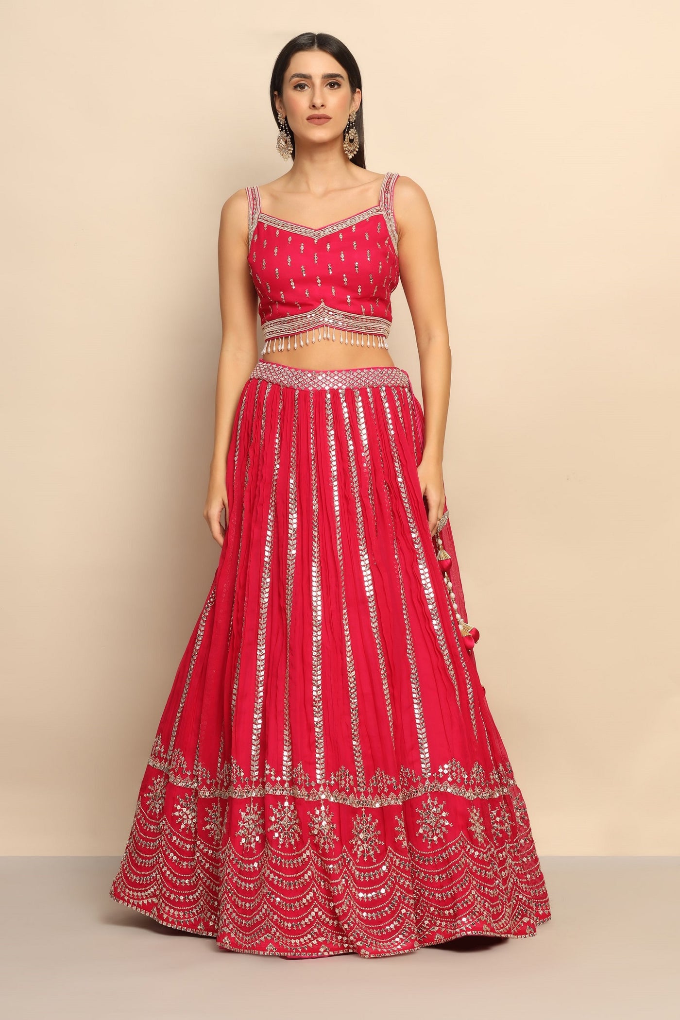 woman in magenta georgette lehenga without dupatta