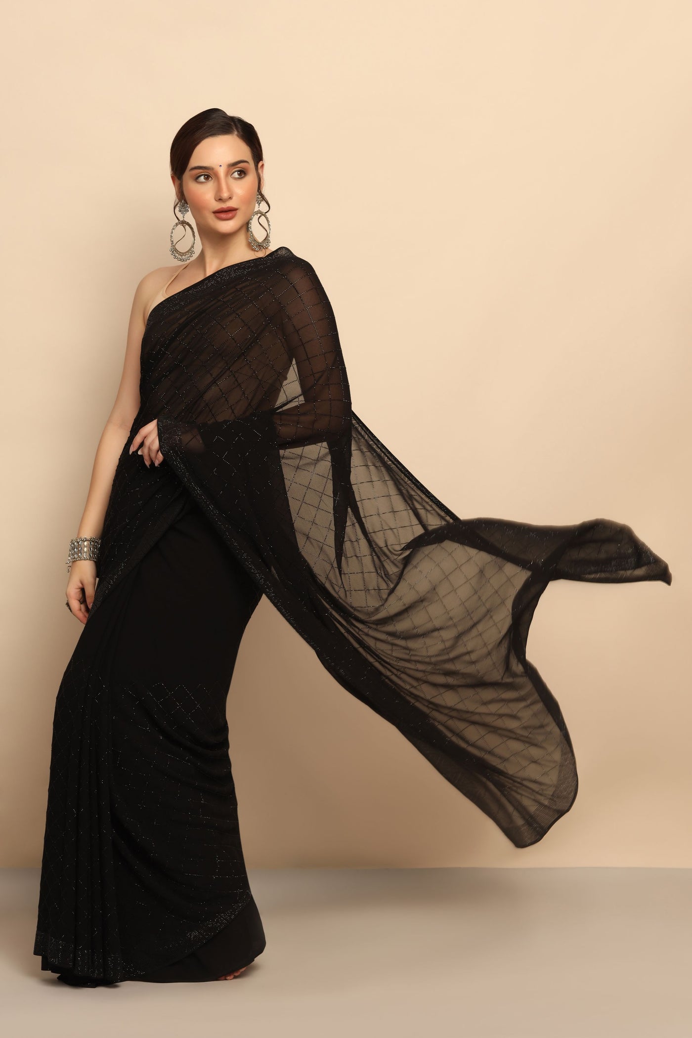 Timeless Elegance: Black Georgette Saree with Graceful Drape