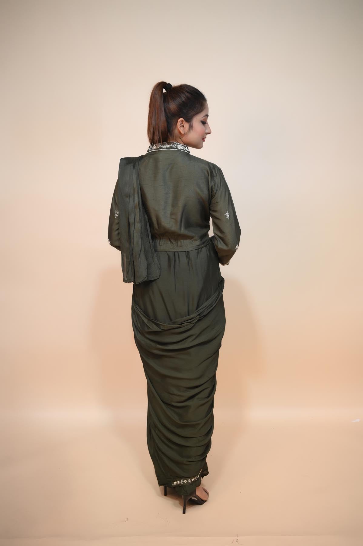 full back look of mehndi green silk dress