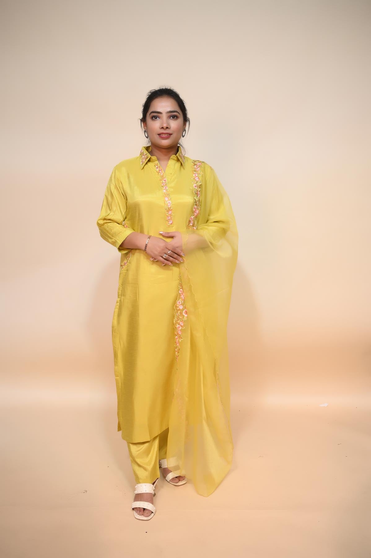 full front look of light yellow crepe suit