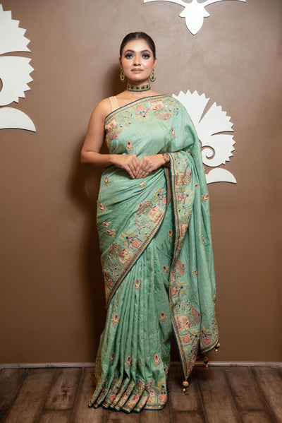 adorable green color floral motif embroidered saree
