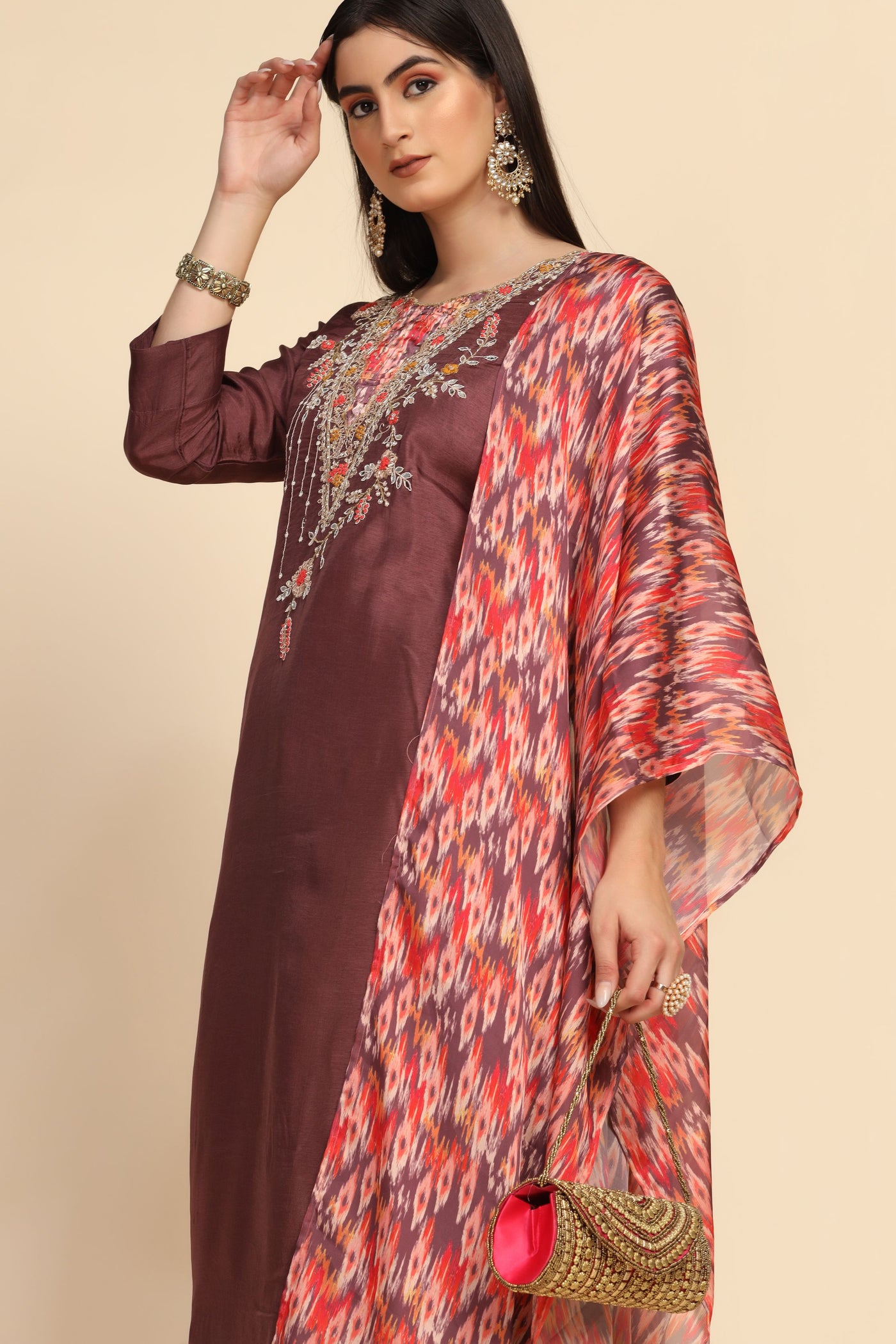 girl wearing Cinnamon Color Floral Motif Embroidered Suit