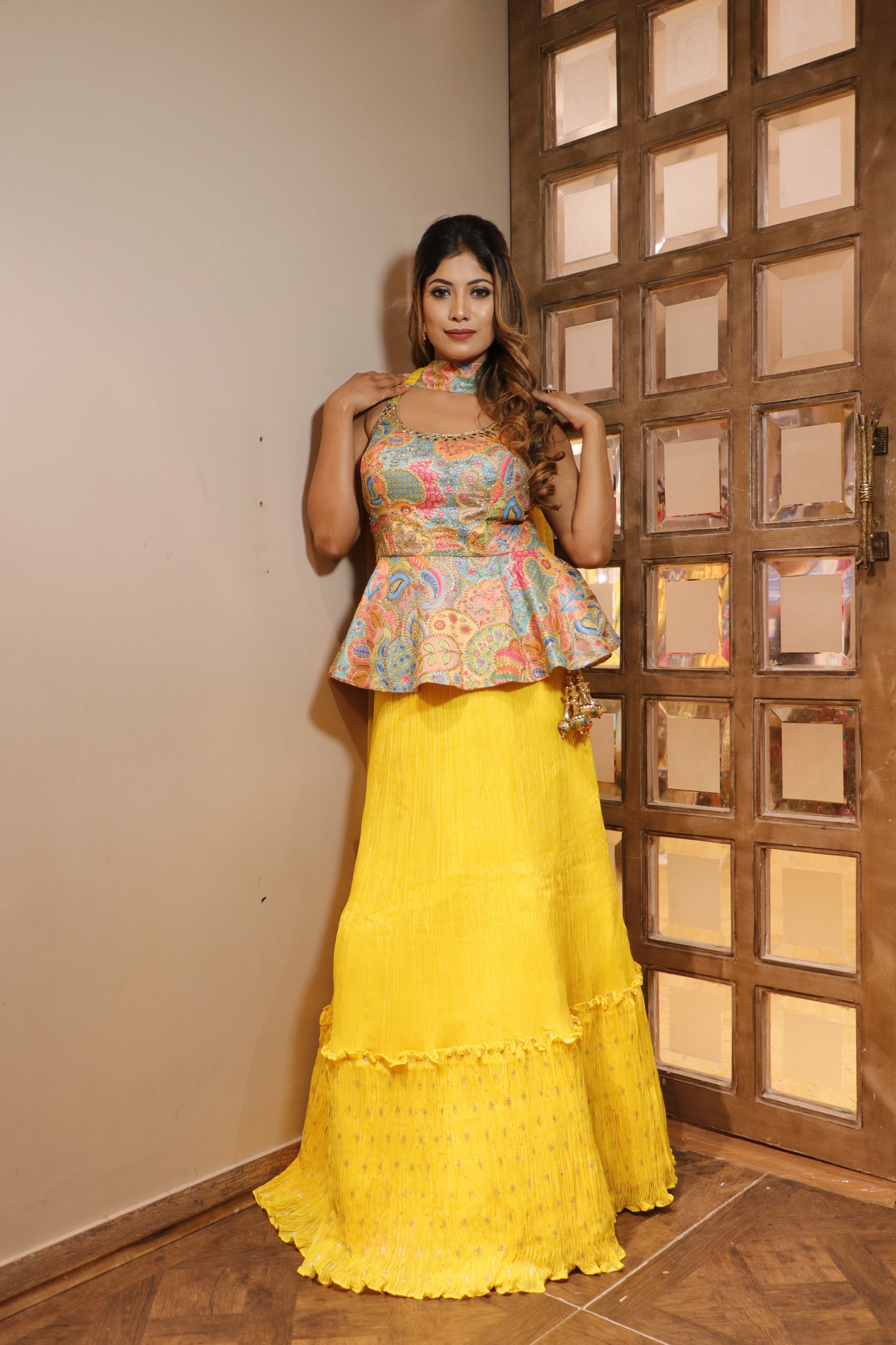 Front look of yellow floral lehenga