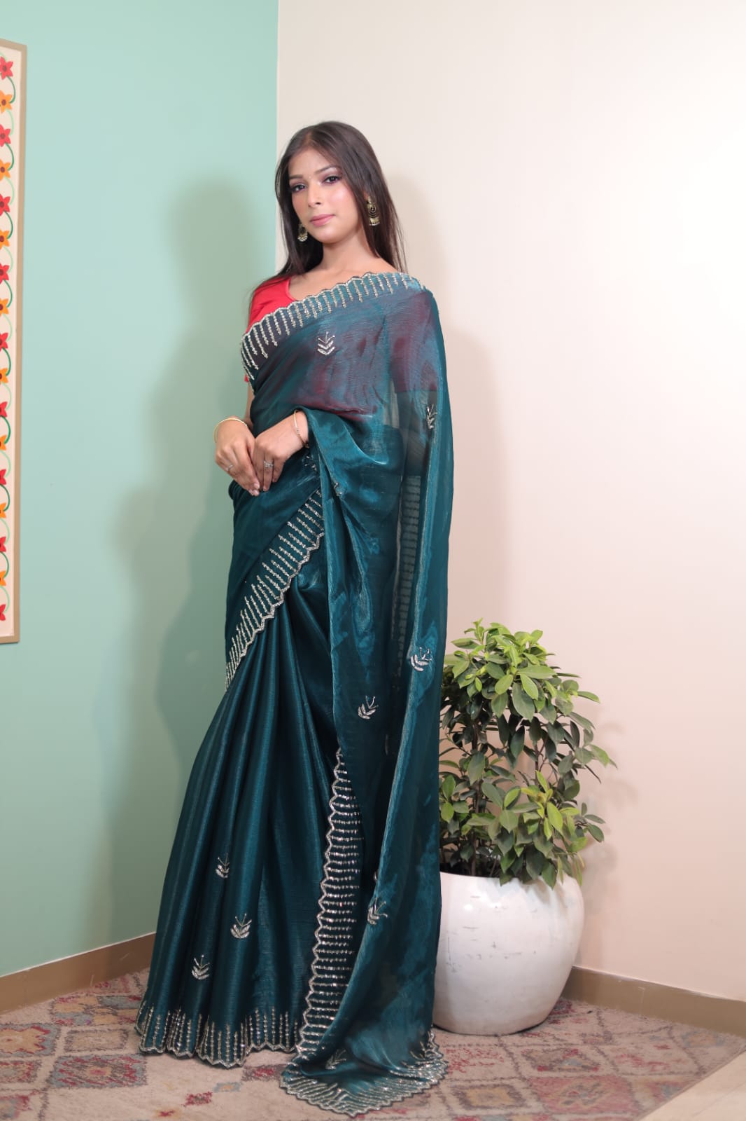 Elegant Teal Tissue Saree with Intricate Embroidery