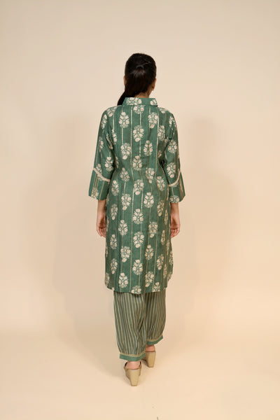 full back look of green silk kurti