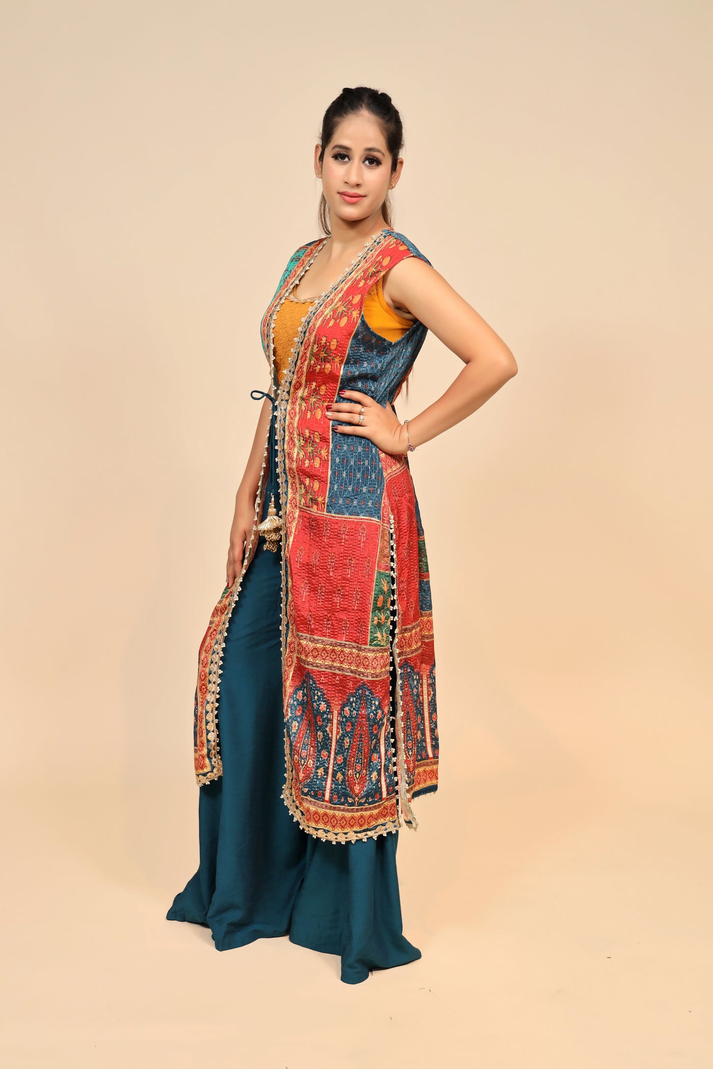 model posing wearing multicolor georgette dress