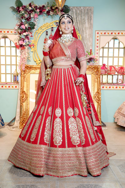beautiful red  color bridal embroidered lehenga with heavy blouse and matching dupatta
