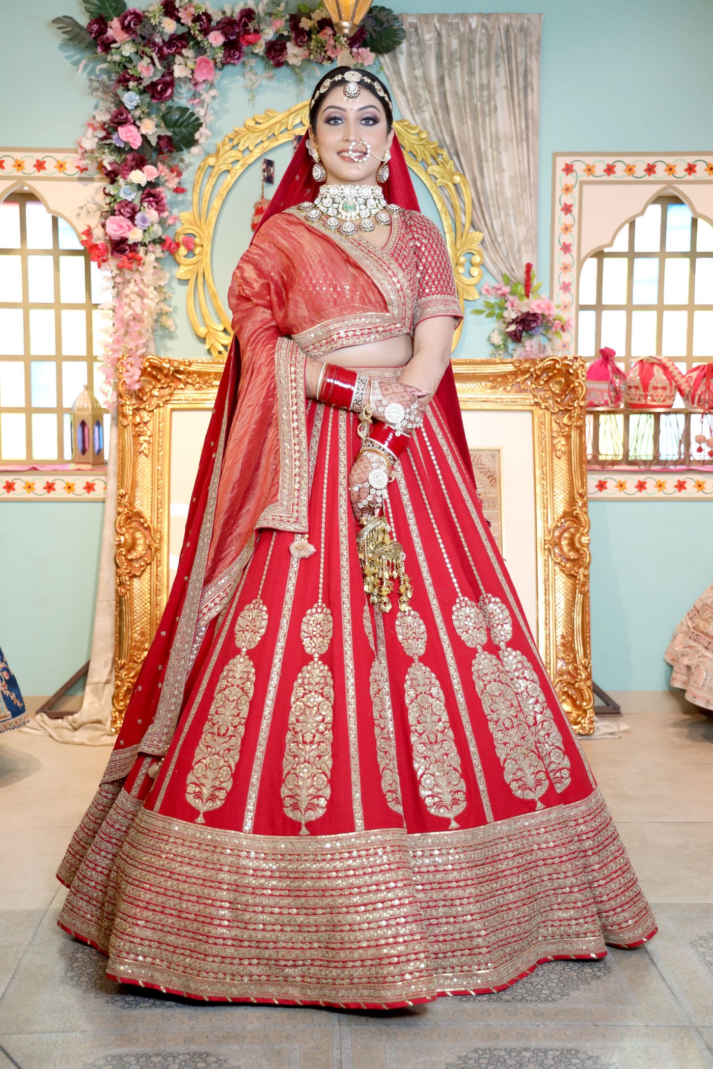 2-red-and-gold-brocade-peplum-long-blouse-over-a-plan-red-lehenga-with-a-net-red-supatta  - Witty Vows
