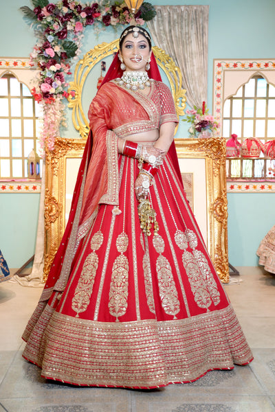 beautiful red  color bridal embroidered lehenga with heavy blouse and matching dupatta