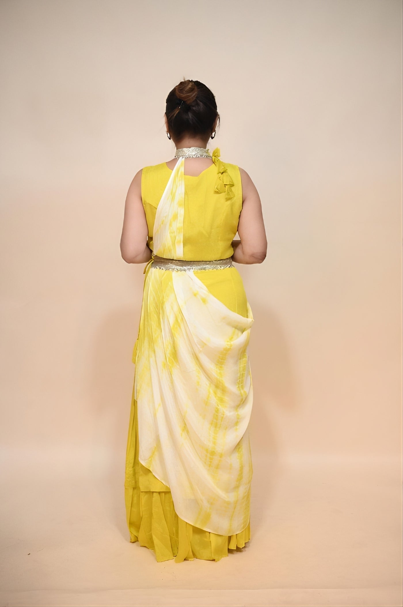 full back look of yellow georgette dress