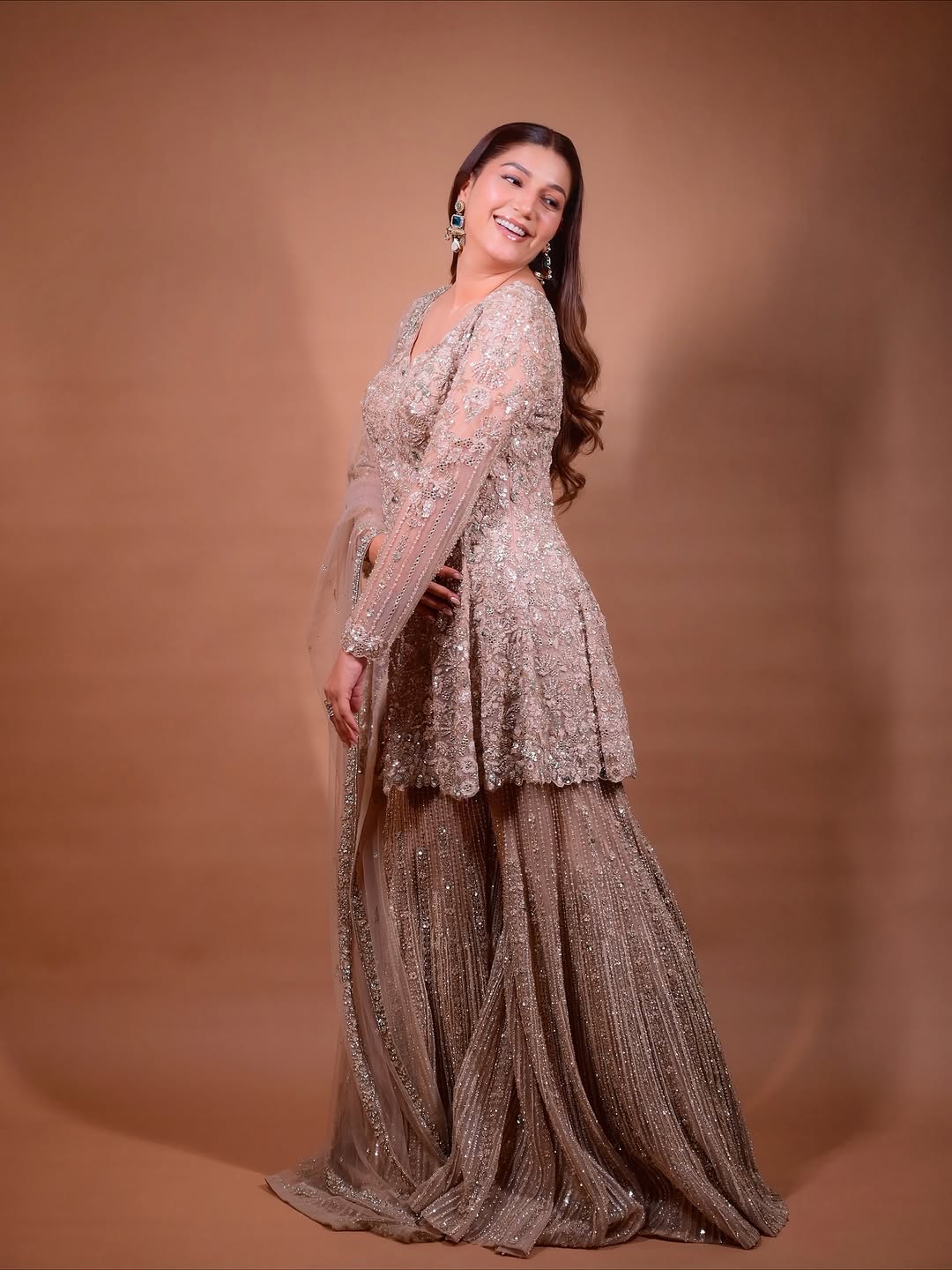 The Luxury Shimmering Peplum Sharara Wore by "Sapna Choudhary"