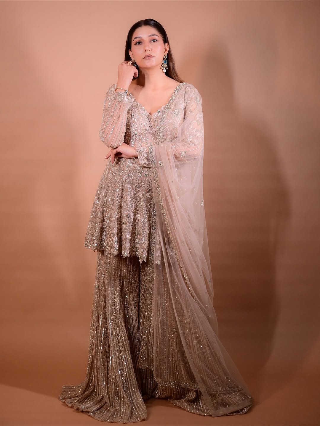 The Luxury Shimmering Peplum Sharara Wore by "Sapna Choudhary"