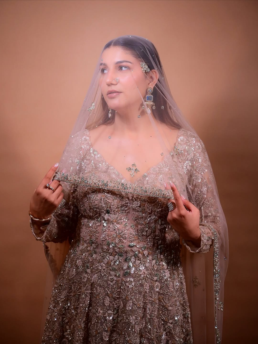 The Luxury Shimmering Peplum Sharara Wore by "Sapna Choudhary"