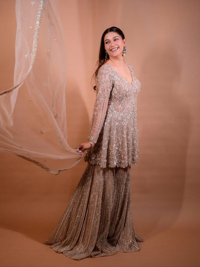 The Luxury Shimmering Peplum Sharara Wore by "Sapna Choudhary"
