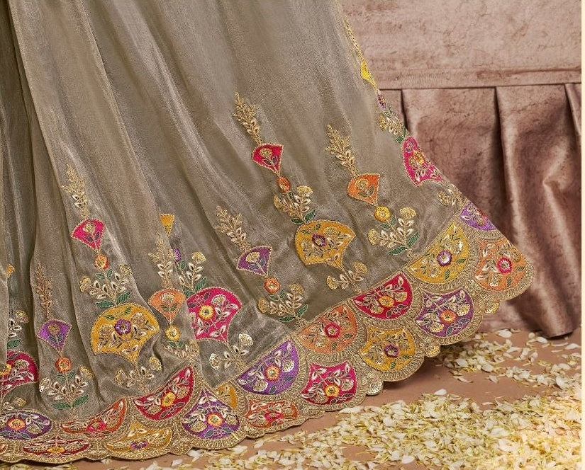 Vibrant Pink Bandhani-Inspired Saree