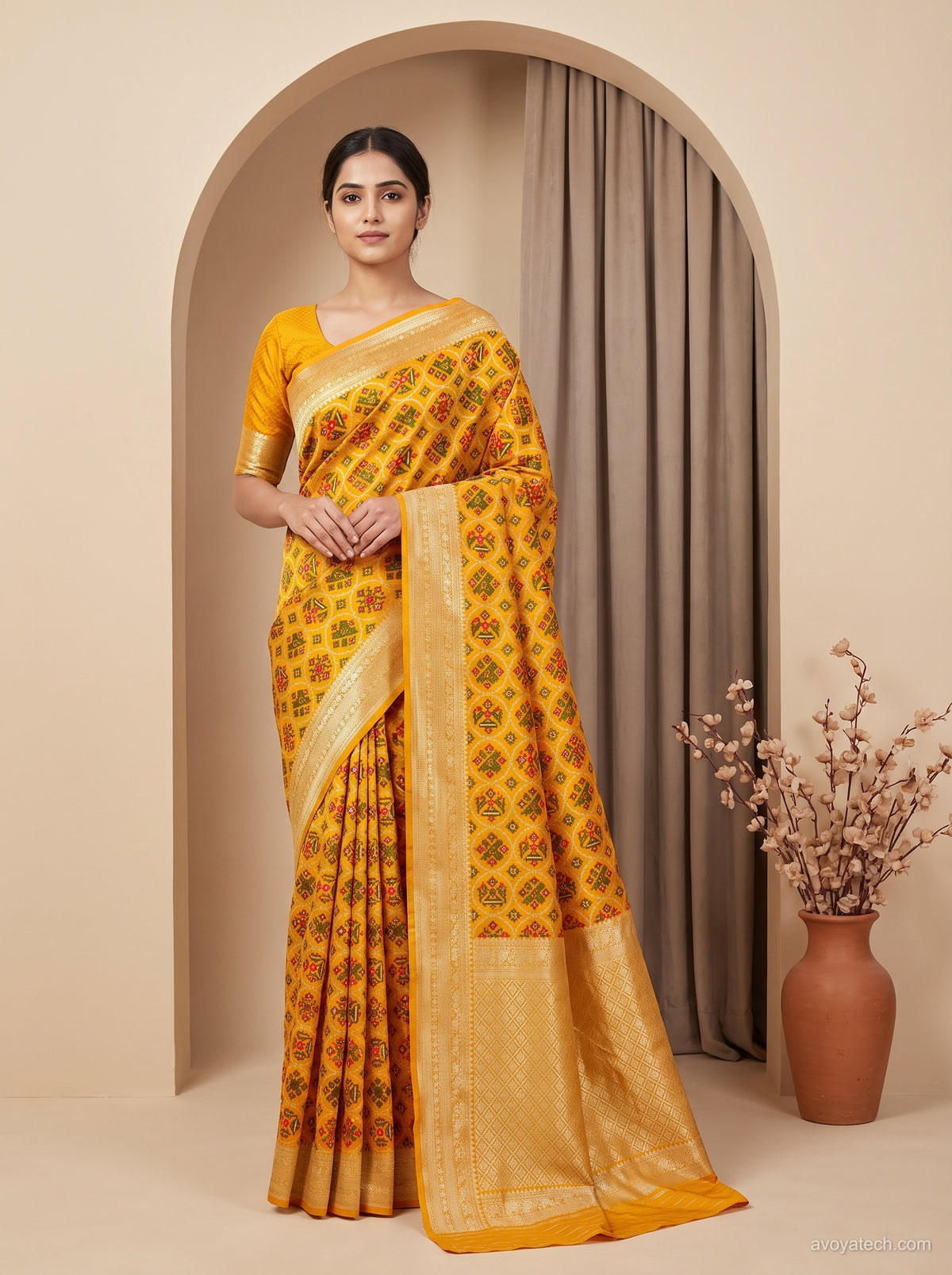Mustard Yellow Patola Print Art Silk Saree with Zari Woven Border