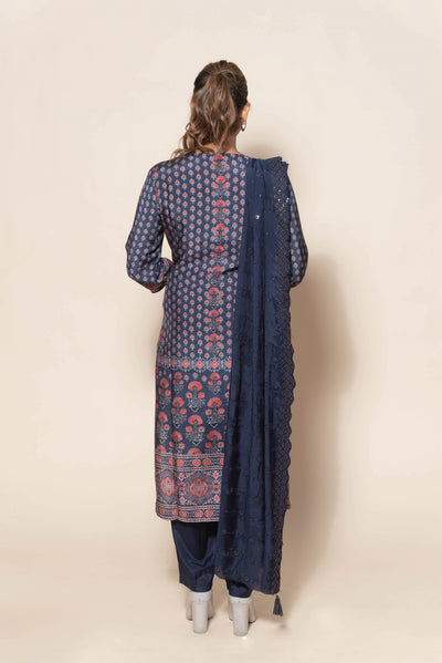 full back look of embroidered muslin suit