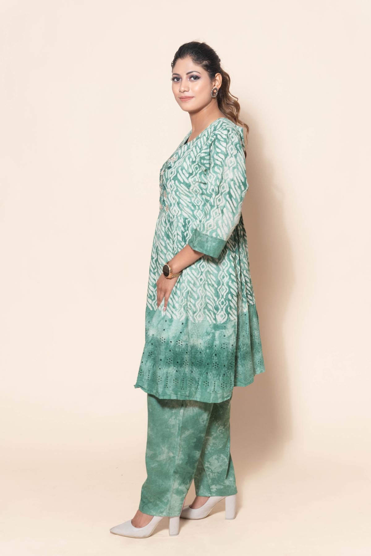 side profile of sea green cotton embroidery suit