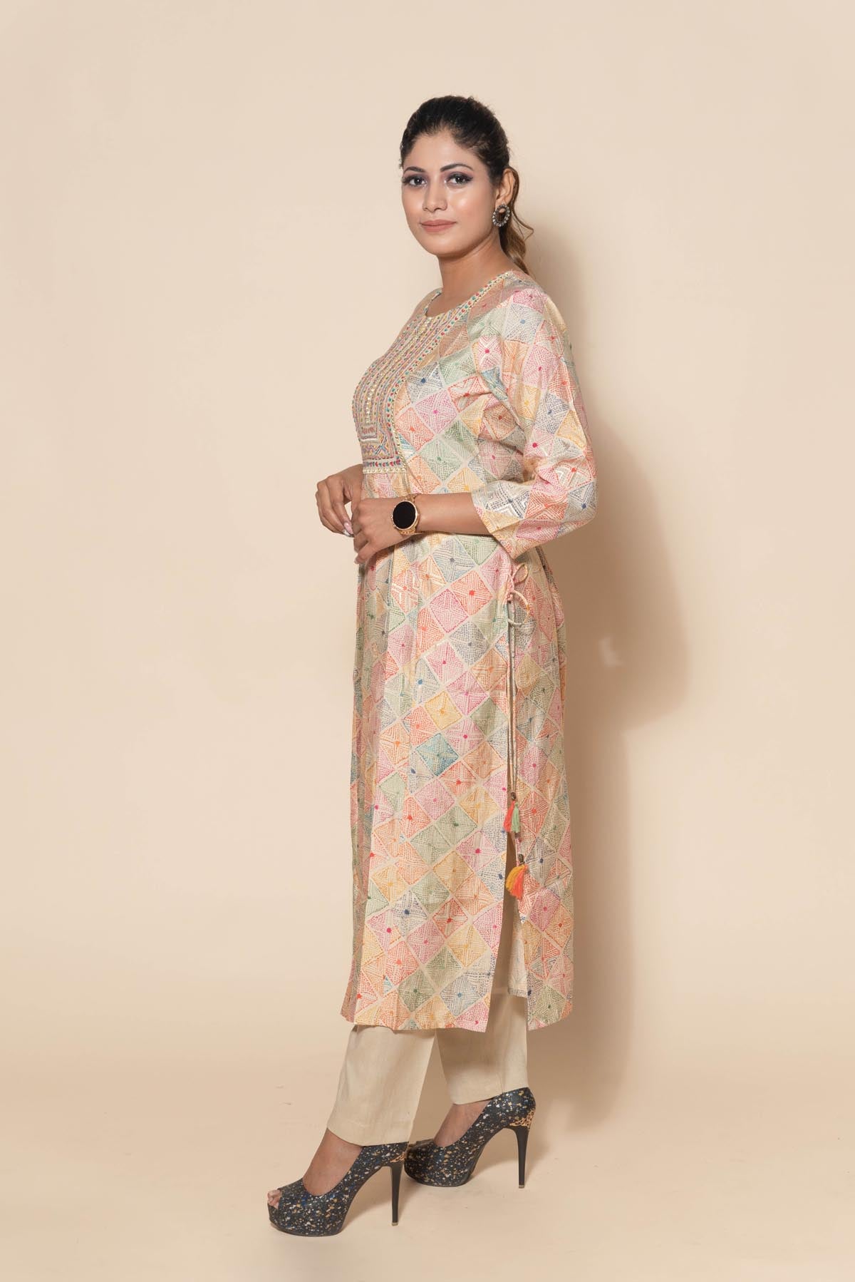 side look of multicolor thread embroidery suit