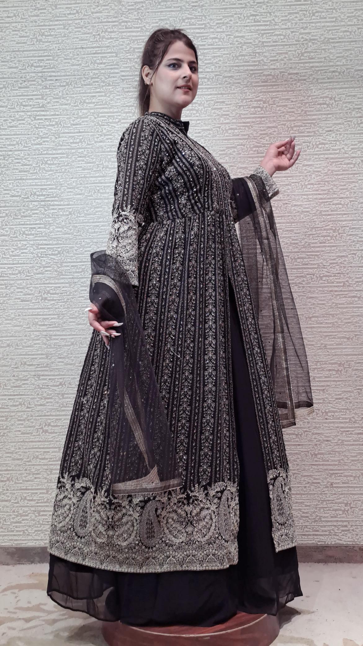 Captivating Black Georgette Suit In A Line With Zari And Stonework