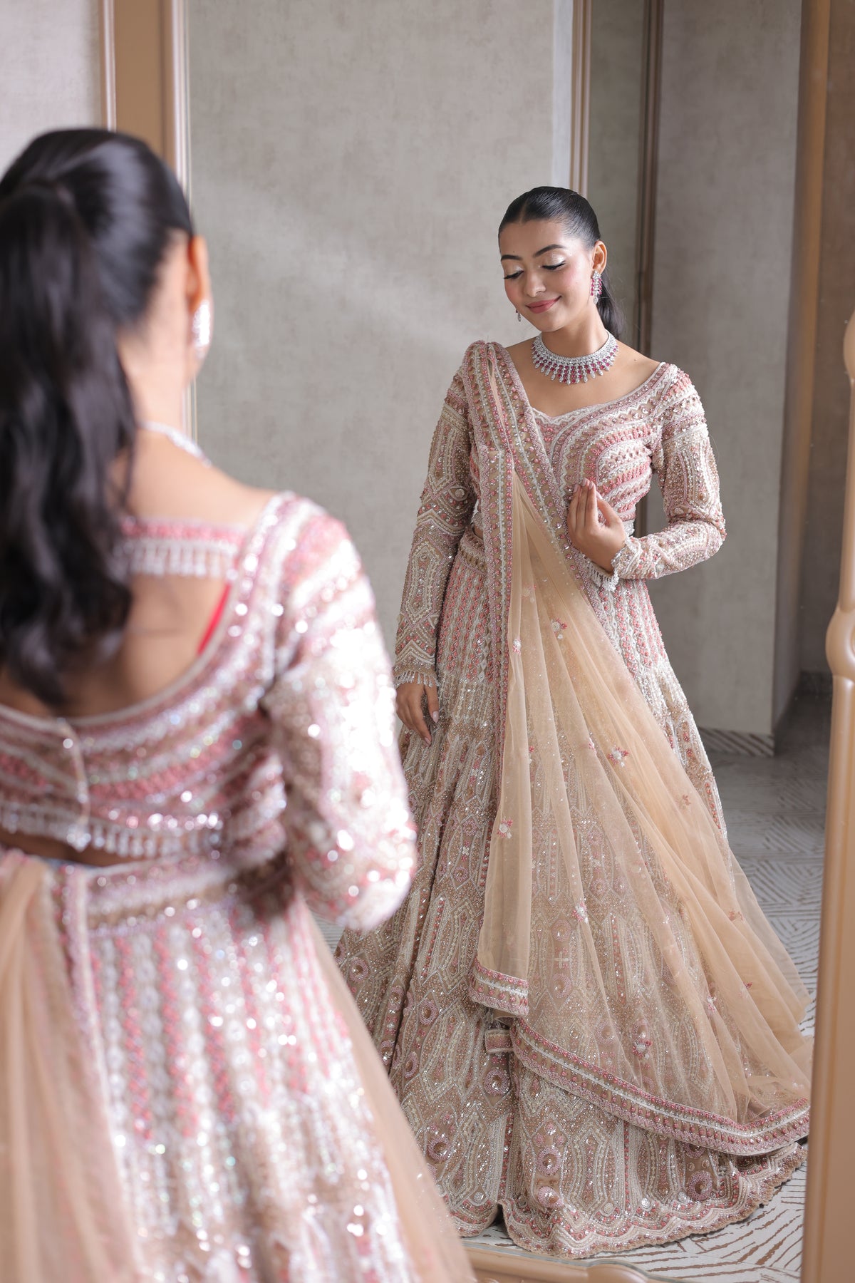 Peach Net Lehenga with Heavy Embroidery & Sequin Work