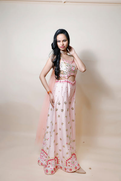 model posing in silk dress with patti work