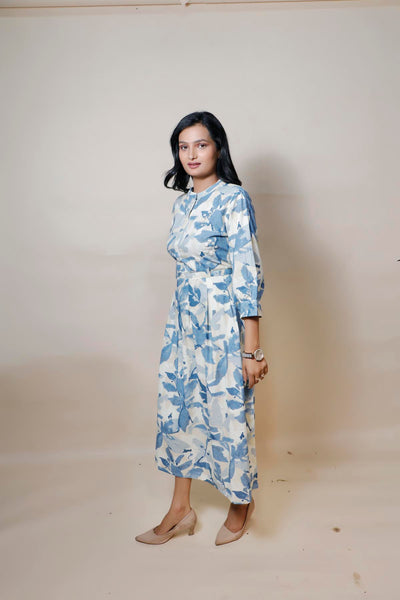 model posing in floral print cotton dress