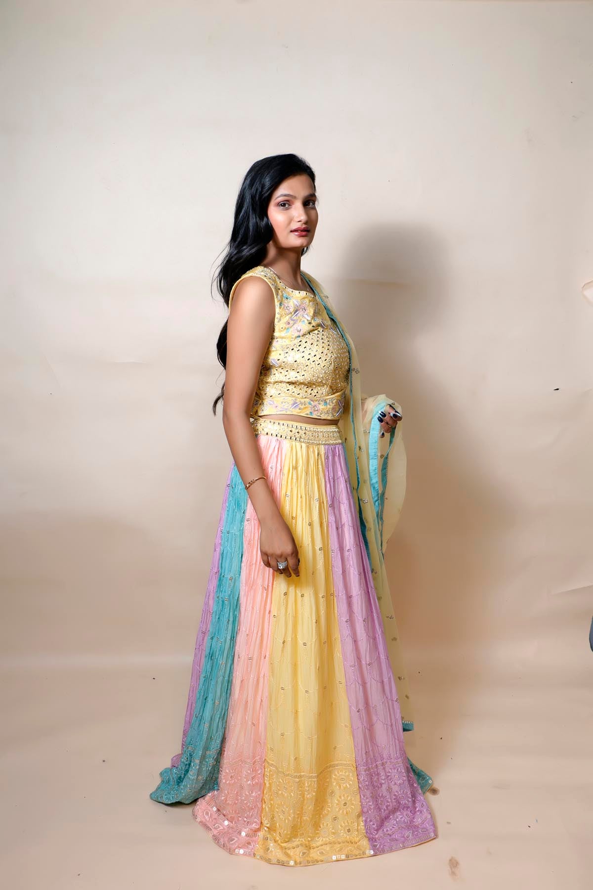 model wearing multicolor silk lehenga