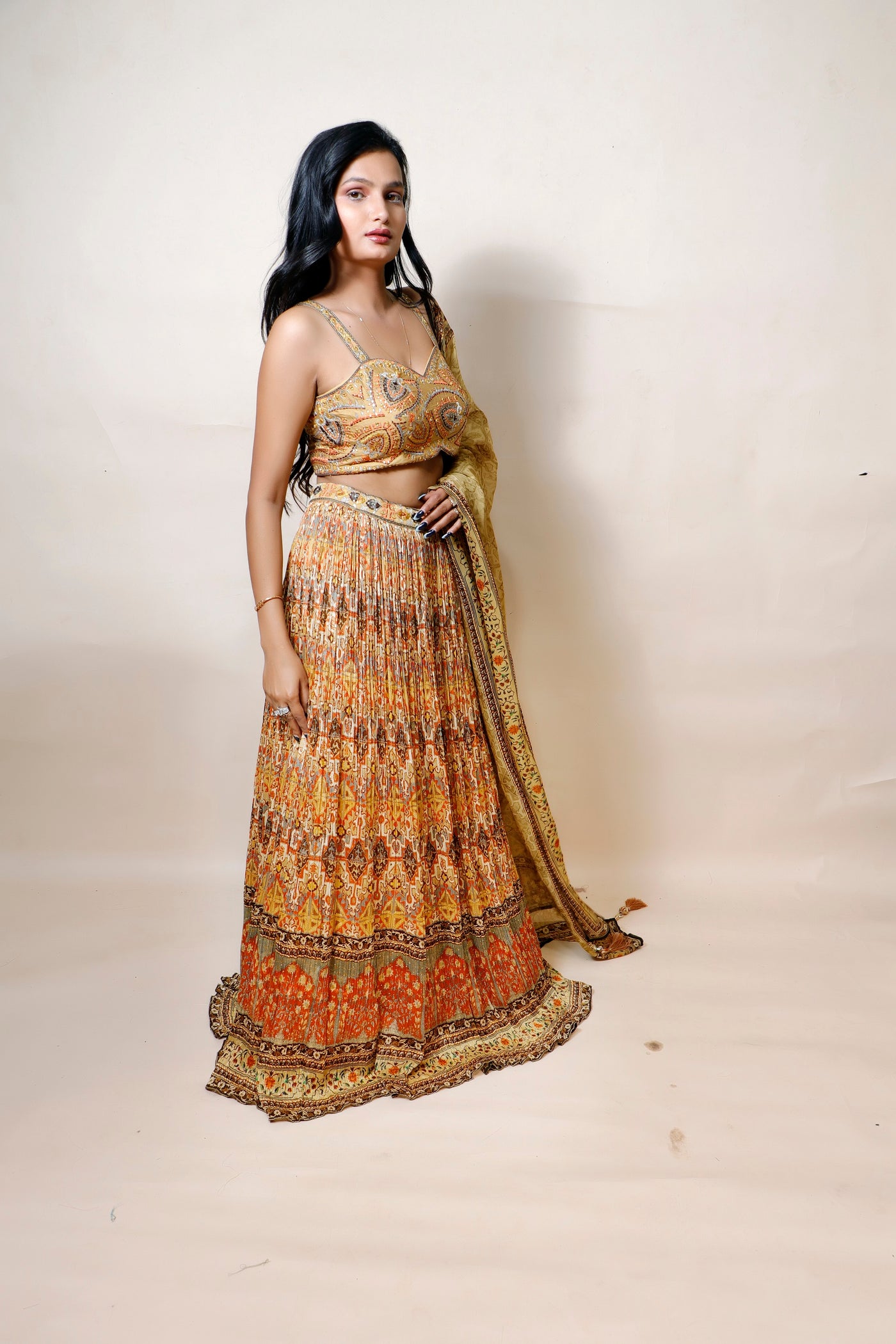 model wearing multicolor silk lehenga