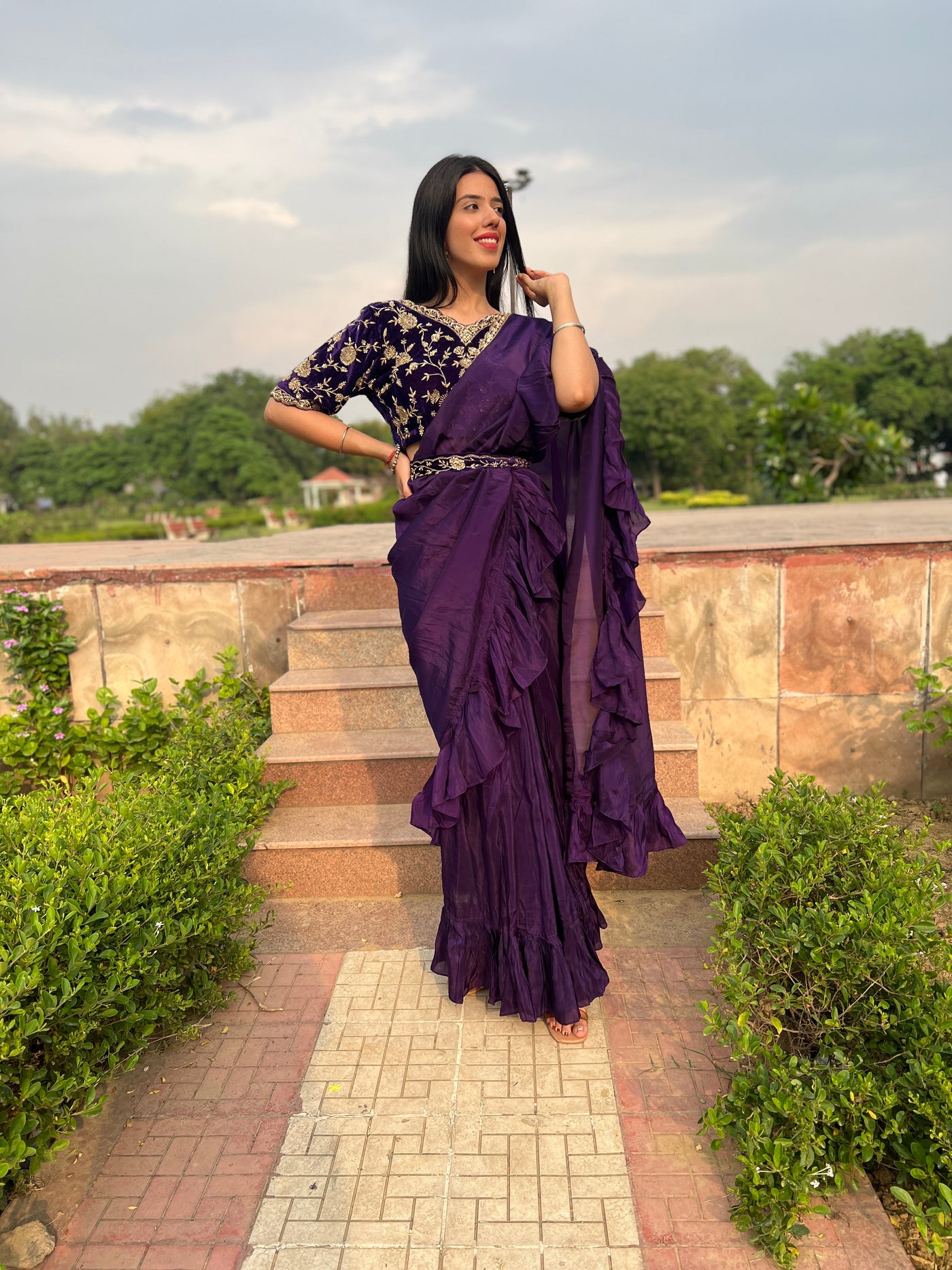 elegant purple color embroidered drape saree