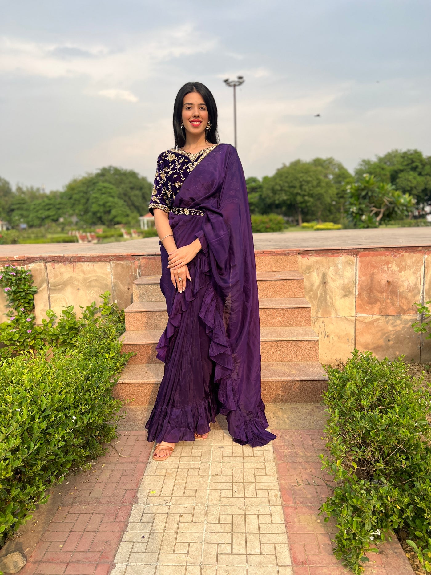 elegant purple color embroidered drape saree