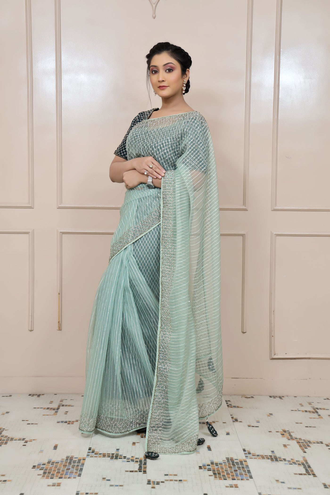 Classy aqua color geometrical motif embroidered saree