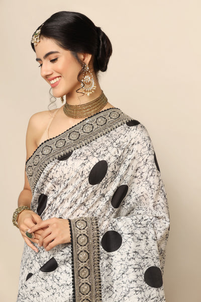 Elegance Redefined: Black and White Saree with Geometrical Print and Sparkling Embellishments