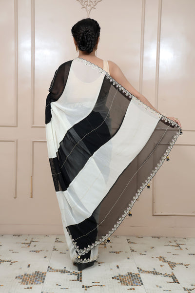adorable black & white color geometrical motif saree