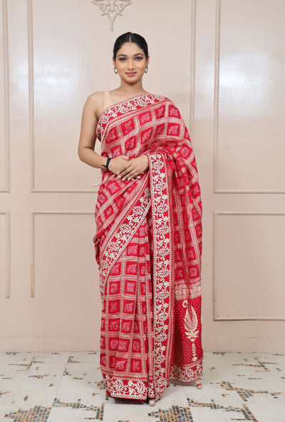 classy red color check with floral motif saree