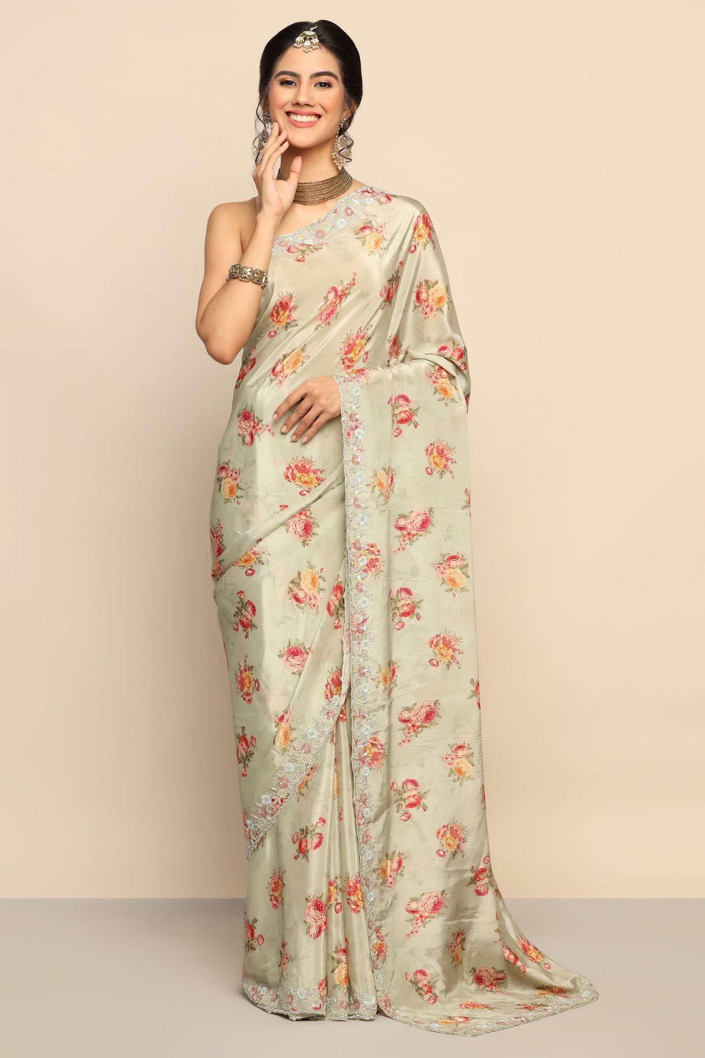 Ethereal Pista Green Satin Saree with Floral Motif and Sparkling Embellishments