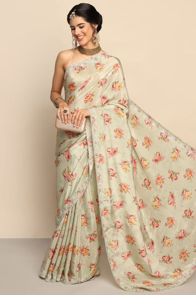 Ethereal Pista Green Satin Saree with Floral Motif and Sparkling Embellishments