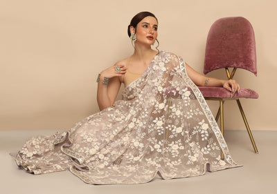 Graceful Lavender Net Saree with Sequins and Thread Work