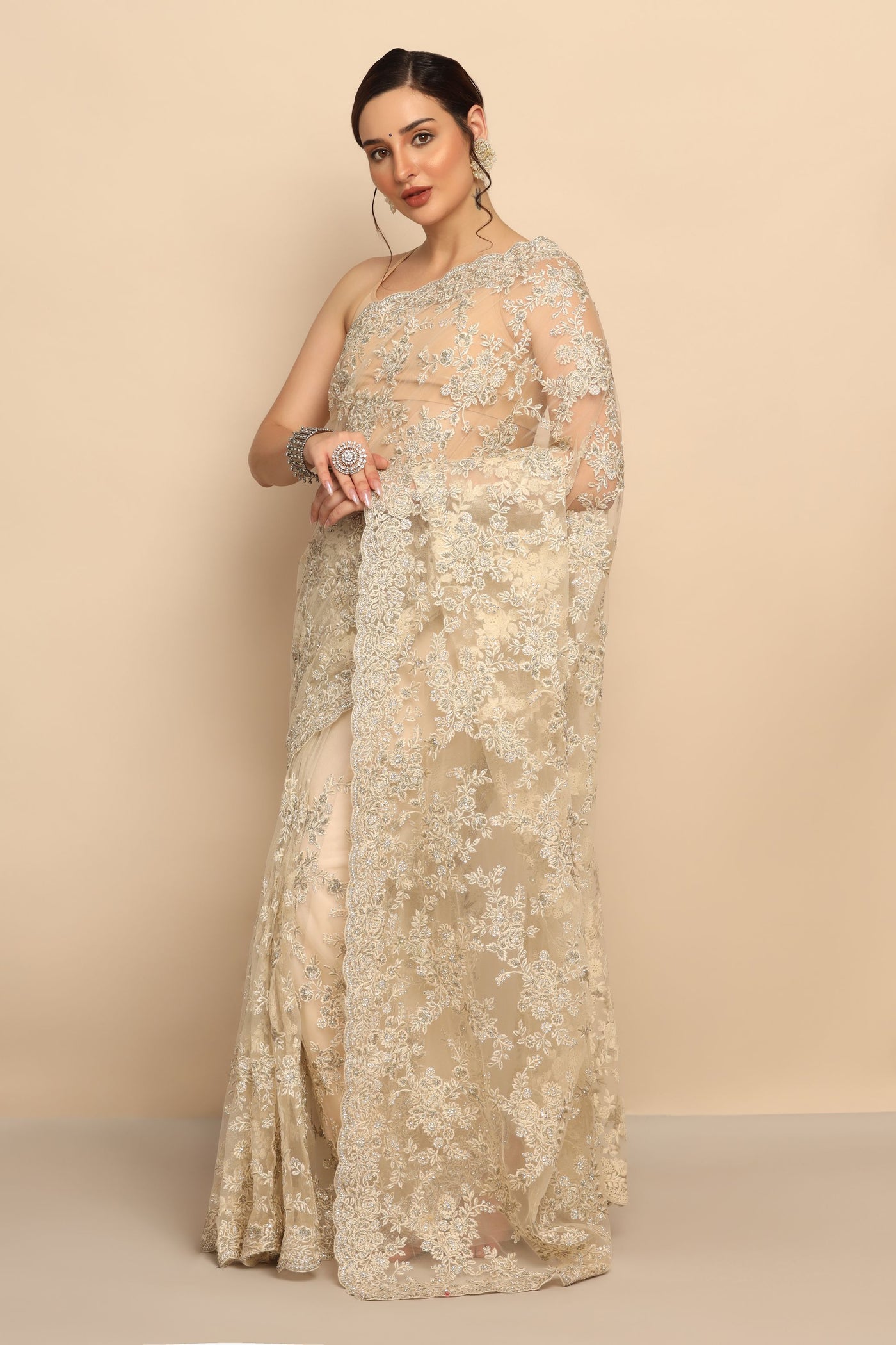 Radiant White Net Saree with Thread Work, Sequins, and Zari