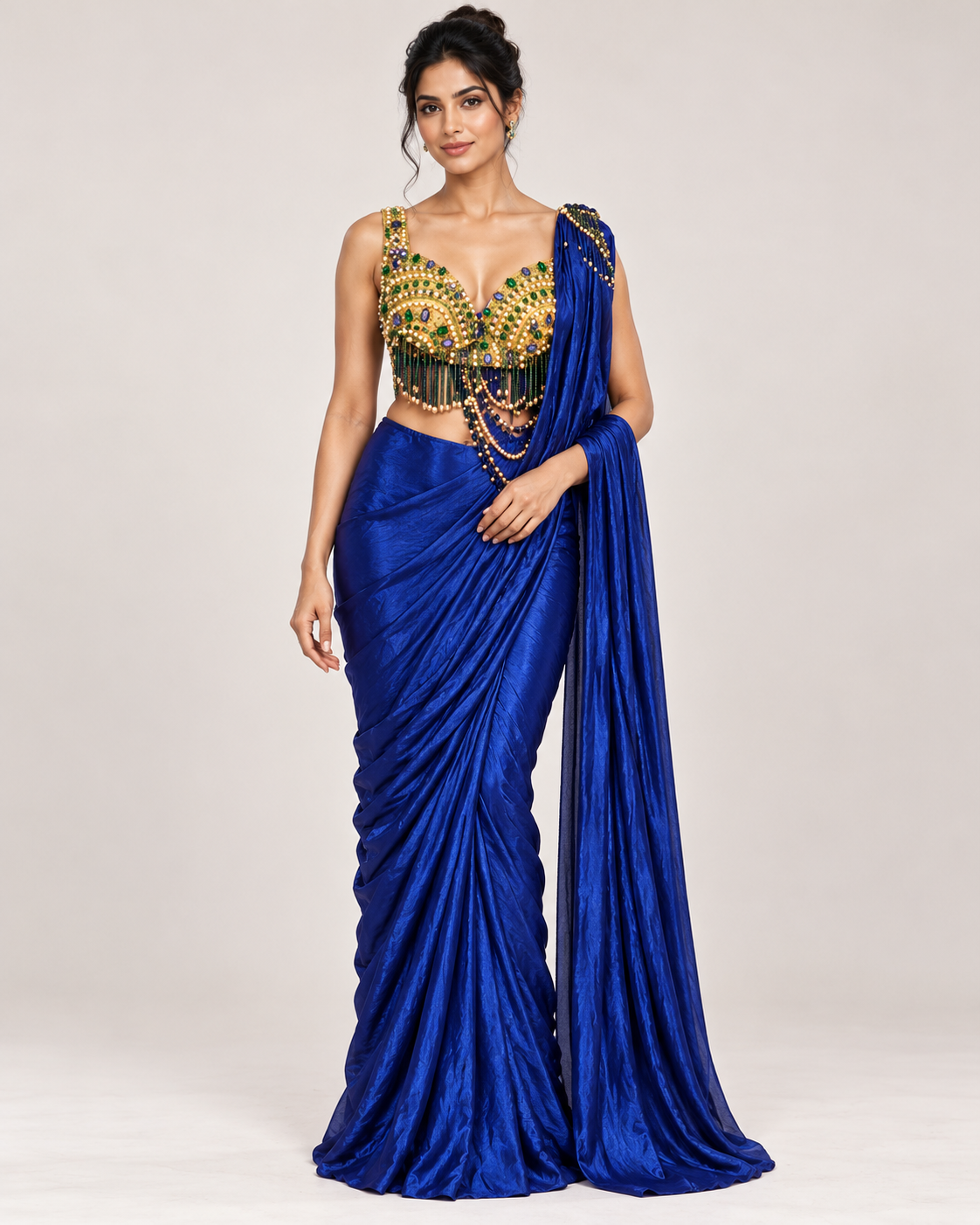 Blue Draped Saree with Jewelled Sleeveless Blouse Main image