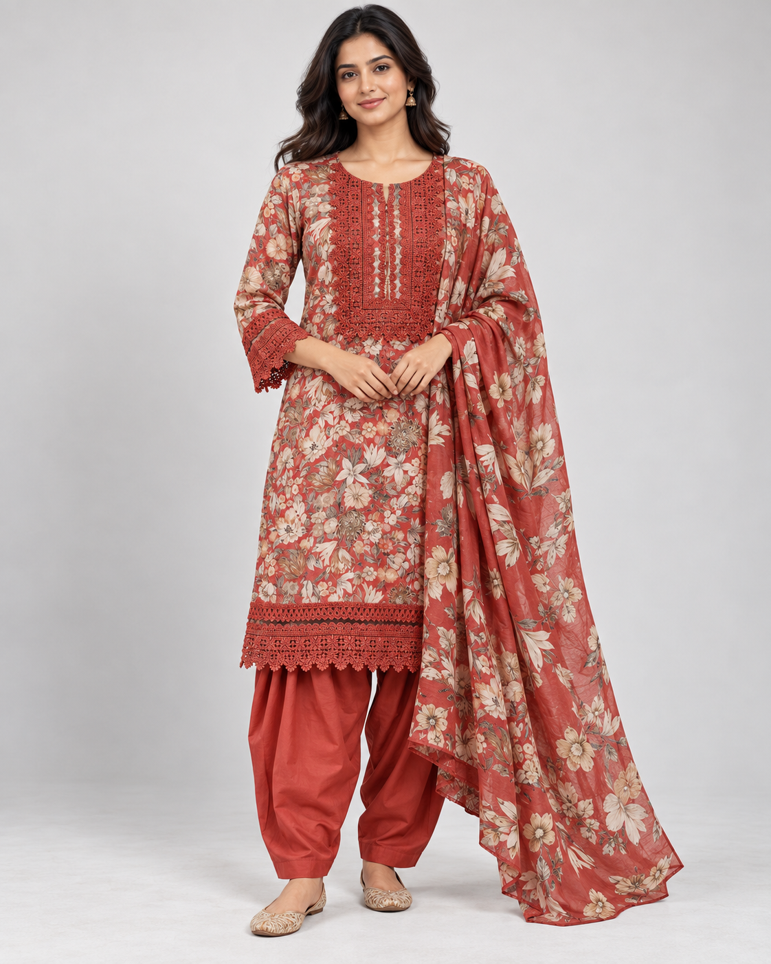 Rust Floral Printed Salwar Suit with Lace Detailing Main image
