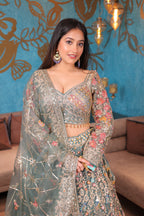 Green intricate pastel lehenga